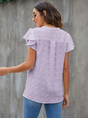 Textured voile blouse in lavender with flutter sleeves and a dotted pattern.