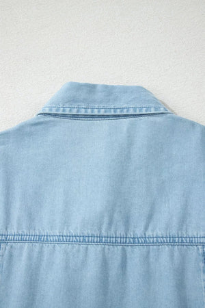 Light blue denim midi dress with collar and button details.