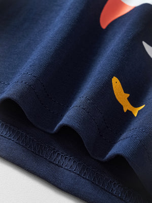 Navy cotton t-shirt with whimsical shark print and crew neck.
