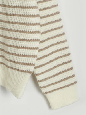 Cream and caramel striped ribbed knit sweater with half-zip detail.