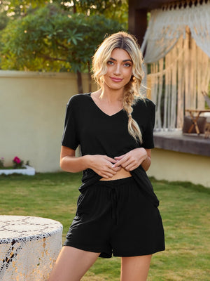 Black V-neck lounge set with short sleeves and drawstring shorts.