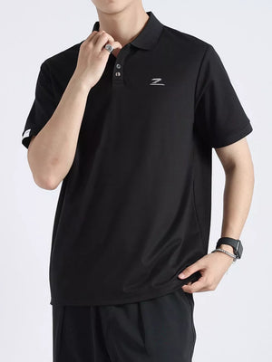 Black textured casual polo shirt with button accents and a subtle logo on the chest.