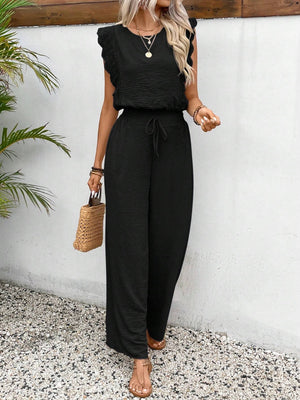 Black textured jumpsuit with ruffle sleeves and drawstring waist