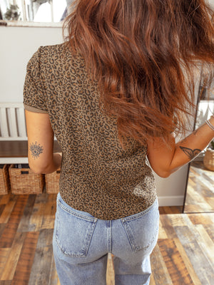 Leopard print relaxed fit t-shirt with short sleeves and a crew neck, styled with denim jeans.
