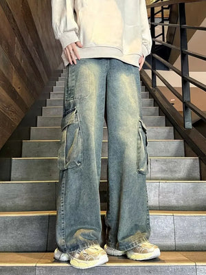 Men's vintage-inspired wide-leg cargo jeans in faded blue denim with multiple pockets.