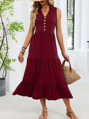 Burgundy tiered midi dress with notched V-neck and decorative buttons.