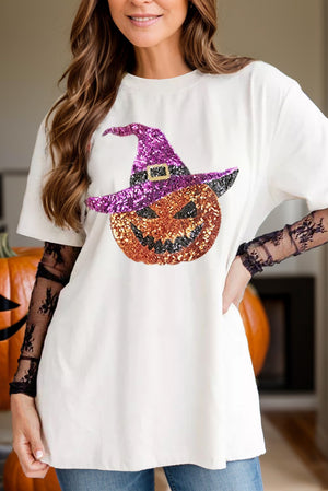 White cotton tee with sequin witch hat pumpkin graphic, short sleeves.