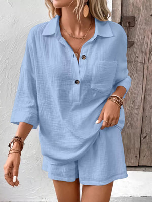 Sky blue cotton two-piece set with button-down shirt and shorts.