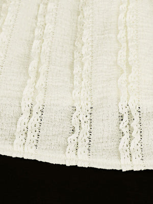 White cami top with vertical textured stripes and lace trim detail