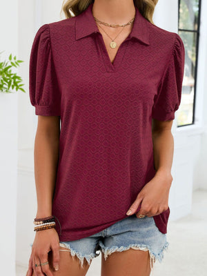 Wine red eyelet collar top with puff sleeves and v-neck.