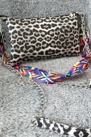 Leopard print shoulder bag with colorful geometric strap and chain detail