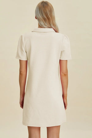 Ivory textured short sleeve mini dress with geometric pattern and collar