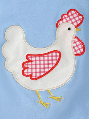 Baby set with a white chicken appliqué featuring pink gingham wings and comb on light blue fabric.