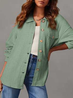 Textured oversized button-down shacket in Gum Leaf green with button details and chest pockets.