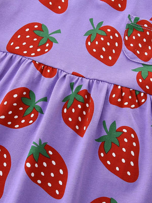 Lavender cotton blend toddler dress with allover red strawberry print and a chest pocket.