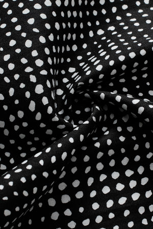 Black dotted puff sleeve blouse fabric detail
