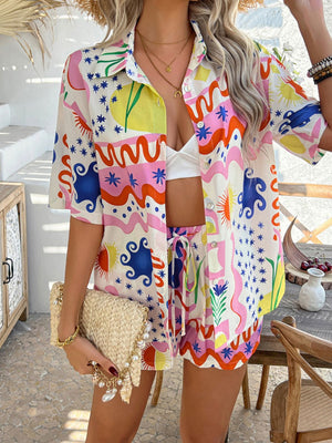 Multicolor button-front shirt and drawstring shorts set with abstract coastal tile print and short sleeves.