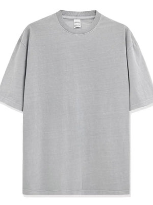 Oversized gray pigment-dyed crewneck t-shirt with short sleeves and a relaxed fit.