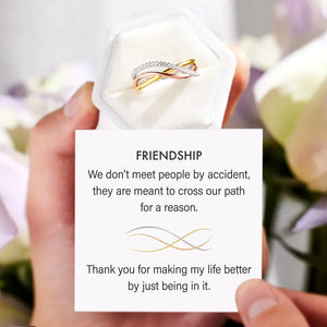 Intertwined trio diamond ring in gold with pave diamonds.
