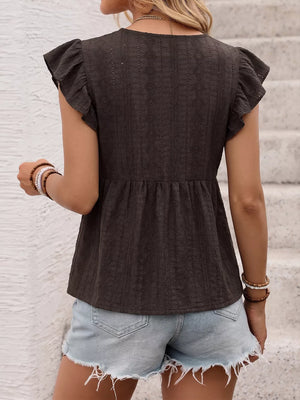 Dark gray maternity shirt with lace trim, ruffled short sleeves, and textured diamond pattern.