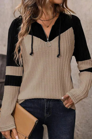 Colorblock ribbed zip-neck hoodie in mocha and black with contrast stripes on sleeves.