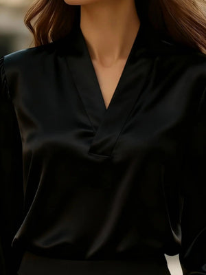 Black satin V-neck blouse with a relaxed fit and subtle sheen.