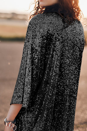 Black sequin kimono jacket with wide sleeves and a relaxed fit.