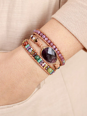 Wrapped amethyst and beaded bracelet with leather cord and colorful stones