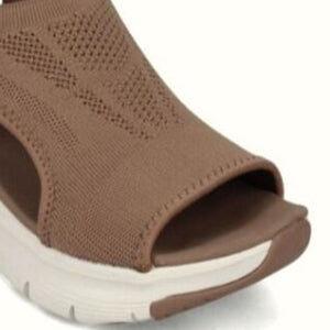 Brown knit open-toe wedge sandals with a chunky sole and breathable design.