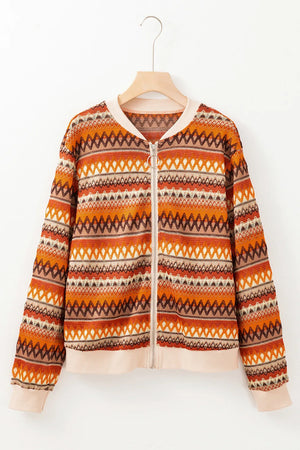 Geometric knit bomber jacket in orange with diamond pattern and zip closure.