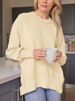 Ribbed-knit relaxed fit sweater in Pastel Yellow with crewneck and long sleeves.