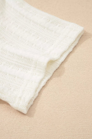 White textured maternity t-shirt with V-neck and button details