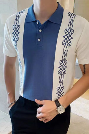 Embroidered panel polo shirt in dusty blue with white sleeves and blue front panel.