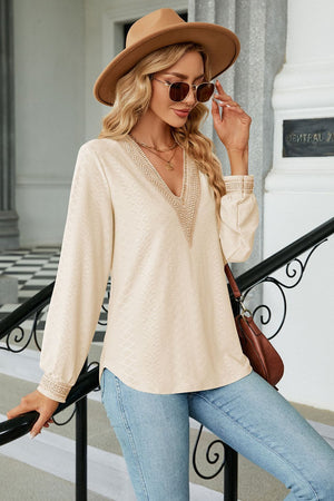 Textured V-neck blouse in Tan with embroidered neckline and cuffs