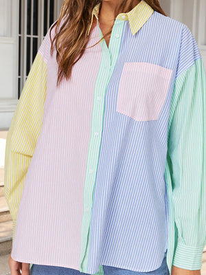 Colorblock striped oversized button-down shirt with pastel panels and chest pocket.