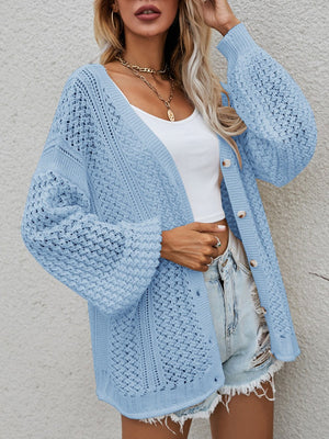 Open-knit button-down cardigan in Cloudy Blue with balloon sleeves and a relaxed fit.
