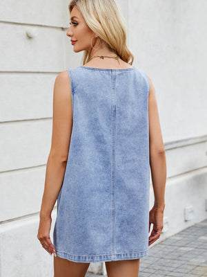 Light blue denim pinafore mini dress with a sleeveless design and a straight hem.