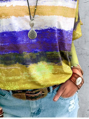 Casual t-shirt with brushstroke stripes in yellow, white, and purple.