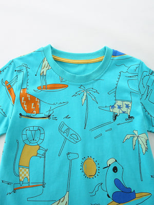 Boys' cotton t-shirt in blue with a whimsical animal adventure print featuring dinosaurs, lions, and giraffes.