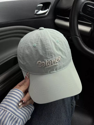 Light Green cotton baseball cap with embroidered Balance logo.