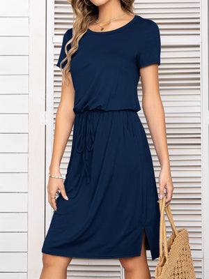 Navy midi dress with drawstring waist, short sleeves, round neck, and side slits.