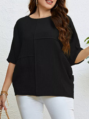 Black textured relaxed-fit t-shirt with short sleeves and a crew neck.