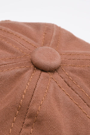Rugged Urban Flex Cap baseball cap in coral with stitched details and button top.