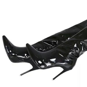 Black patent thigh-high stiletto boots with pointed toes and slender heels.