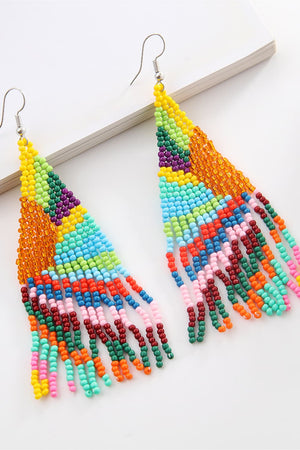 Chic beaded drop earrings in a colorful, geometric pattern with fringe detail.