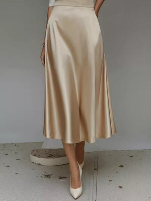 Khaki A-line satin midi skirt with pockets, flowing and elegant.
