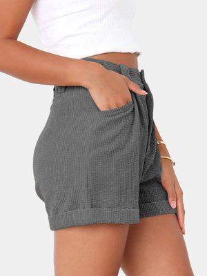 Dark Gray corduroy high-waist shorts with pleats and cuffed hems.