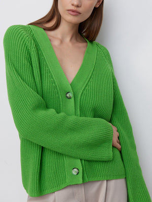 Green ribbed raglan cardigan with deep V-neck and button front.