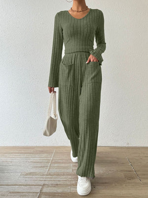 Moss green ribbed knit lounge set with v-neck top and wide-leg pants with pockets.