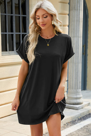 Black t-shirt dress with cuffed short sleeves and a crew neck.